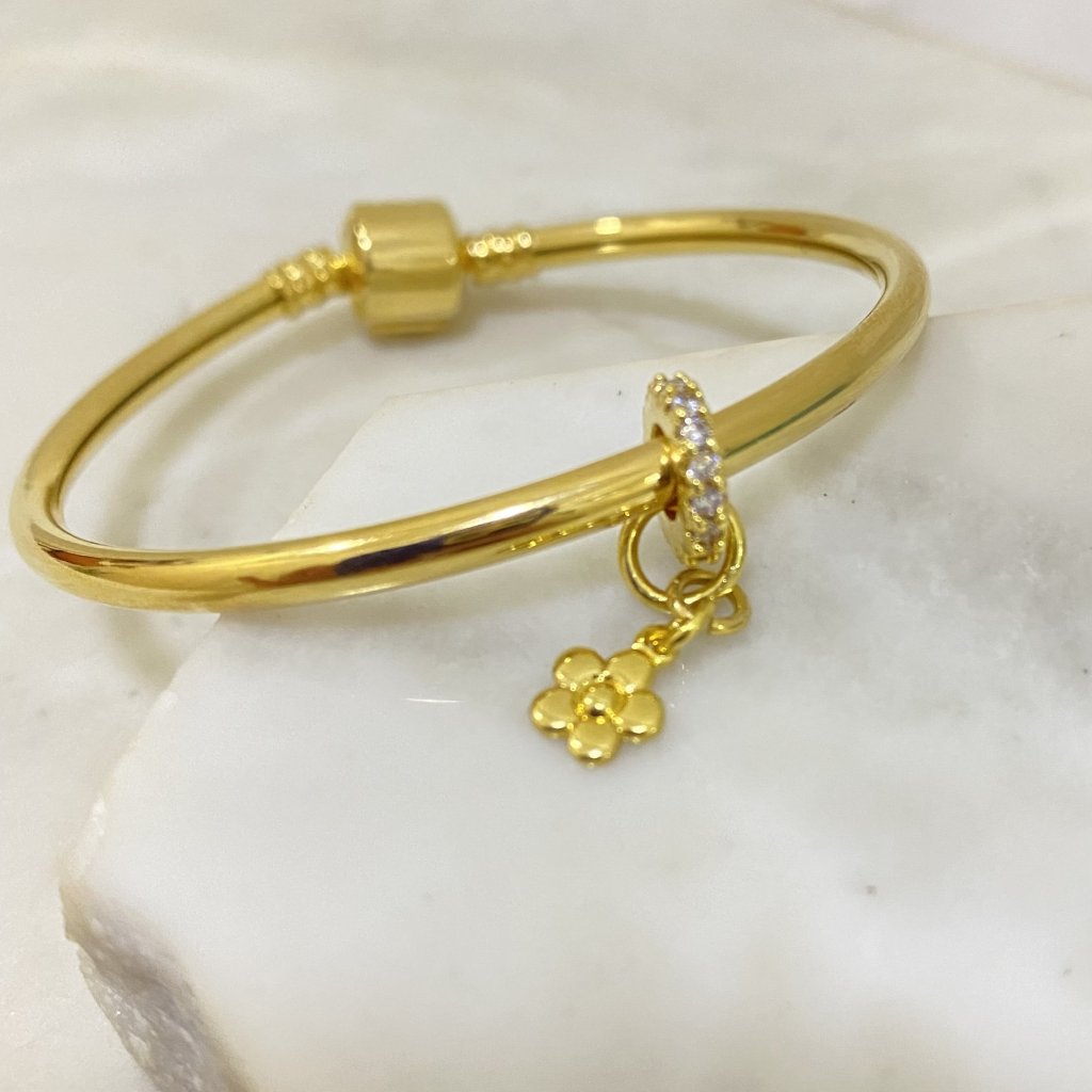 Pulsera inf. esclava con dije florcita